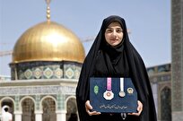 اهدای مدال طلای بانوی ورزشکار به موزه آستان قدس رضوی